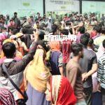 Garment workers block road in Chittagong demanding unpaid wages.