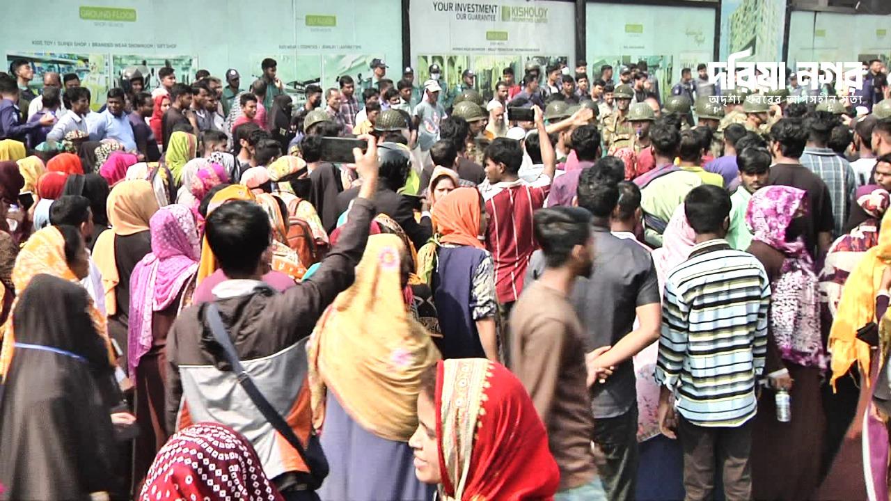 Garment workers block road in Chittagong demanding unpaid wages.